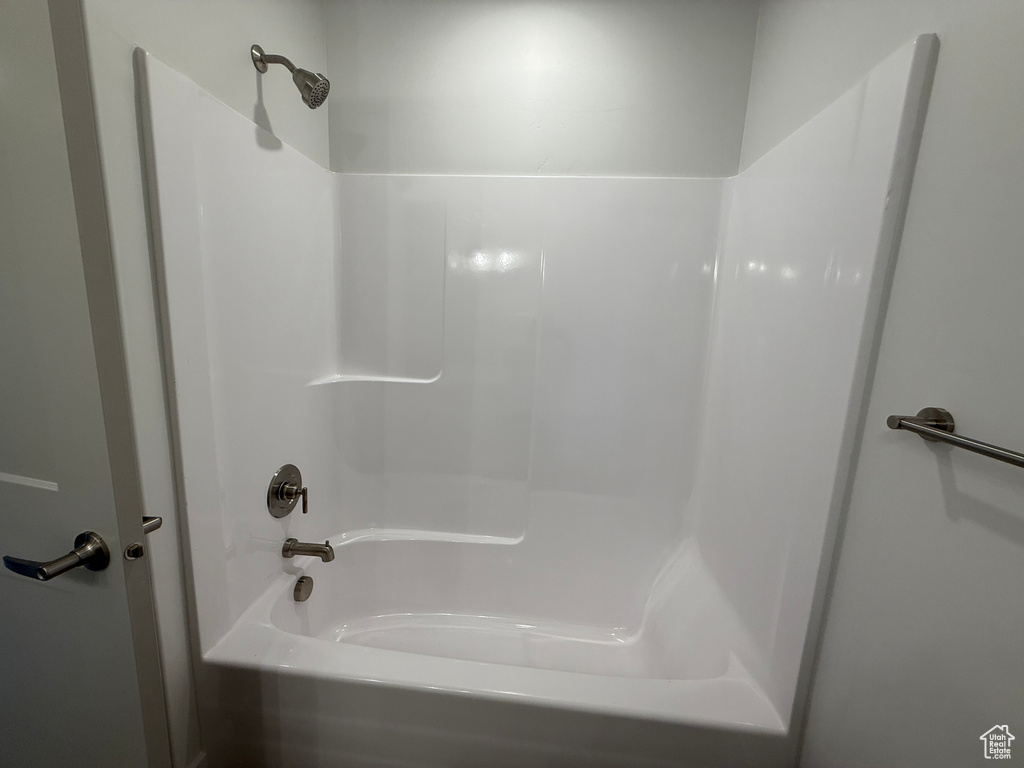 Bathroom featuring shower / bath combination