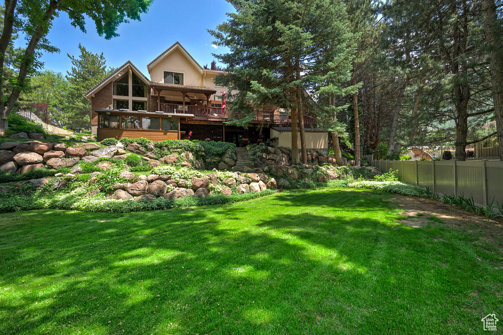 View of yard featuring a deck