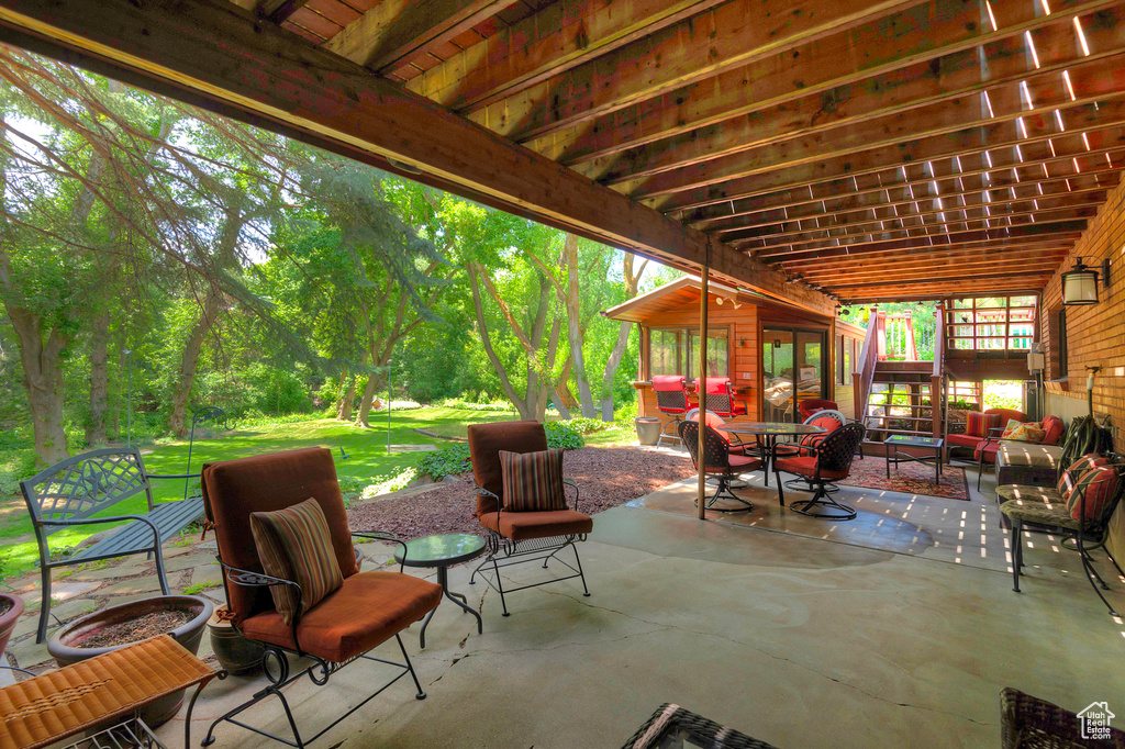 View of patio featuring an outdoor hangout area