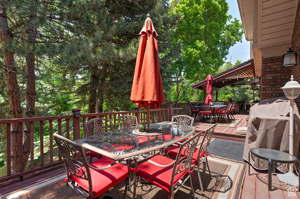 Wooden deck with outdoor dining space