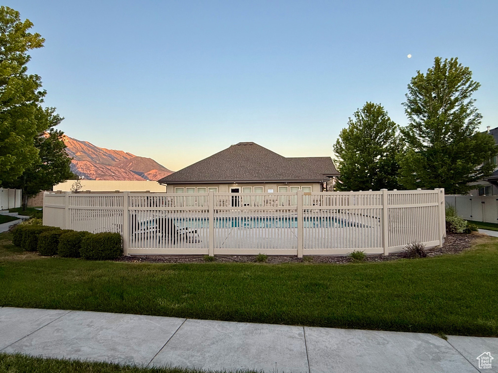 Pool at dusk with a mountain view