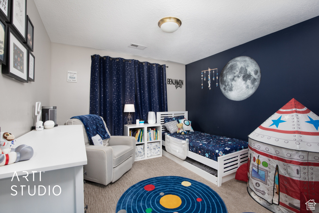 View of carpeted bedroom