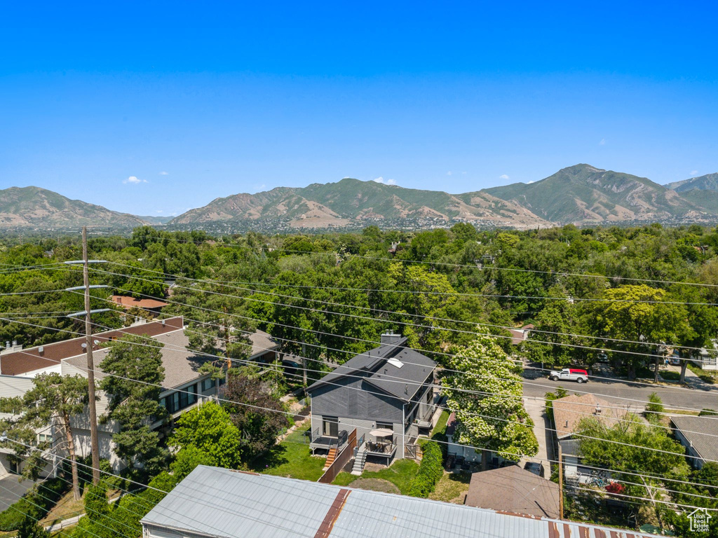 Drone / aerial view of mountains and a heavily wooded area