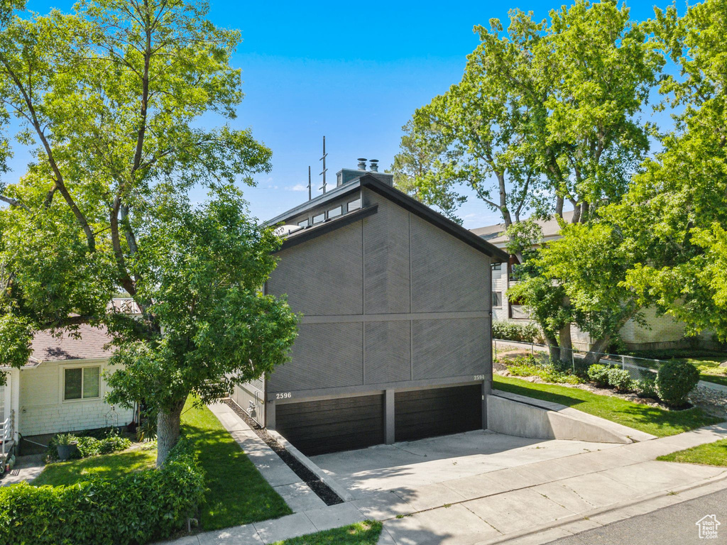 Garage featuring driveway