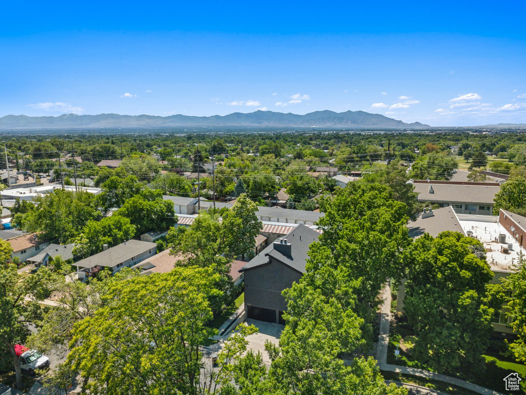 Aerial view of residential area with mountains