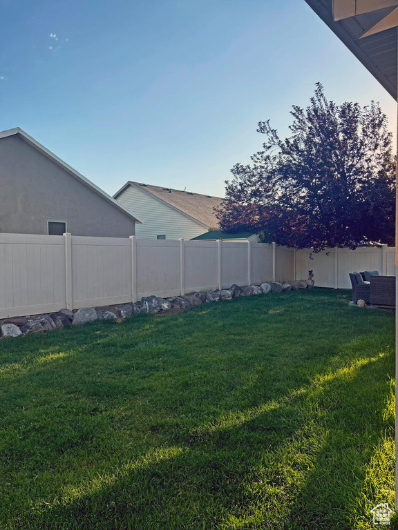 View of fenced backyard