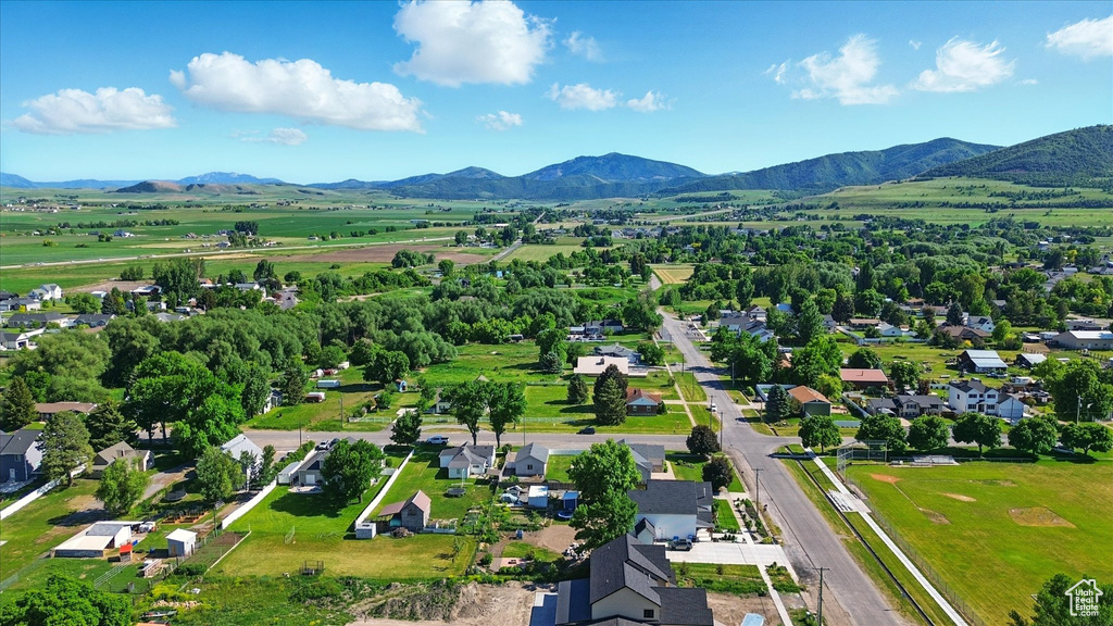 Aerial view of residential area featuring mountains