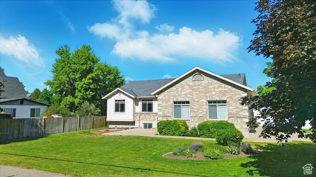 View of front of home featuring brick siding