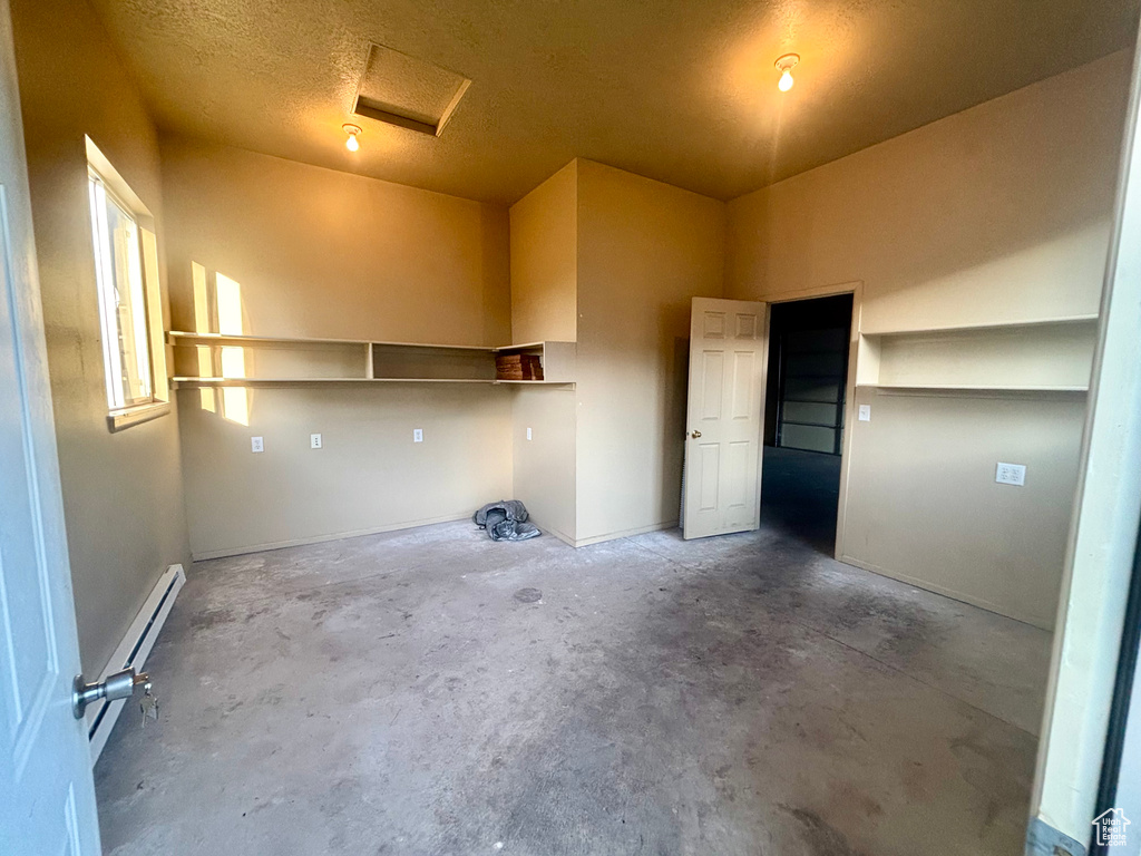 Garage with baseboard heating