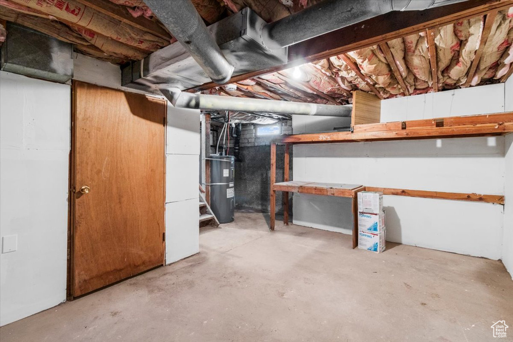 Unfinished basement with water heater