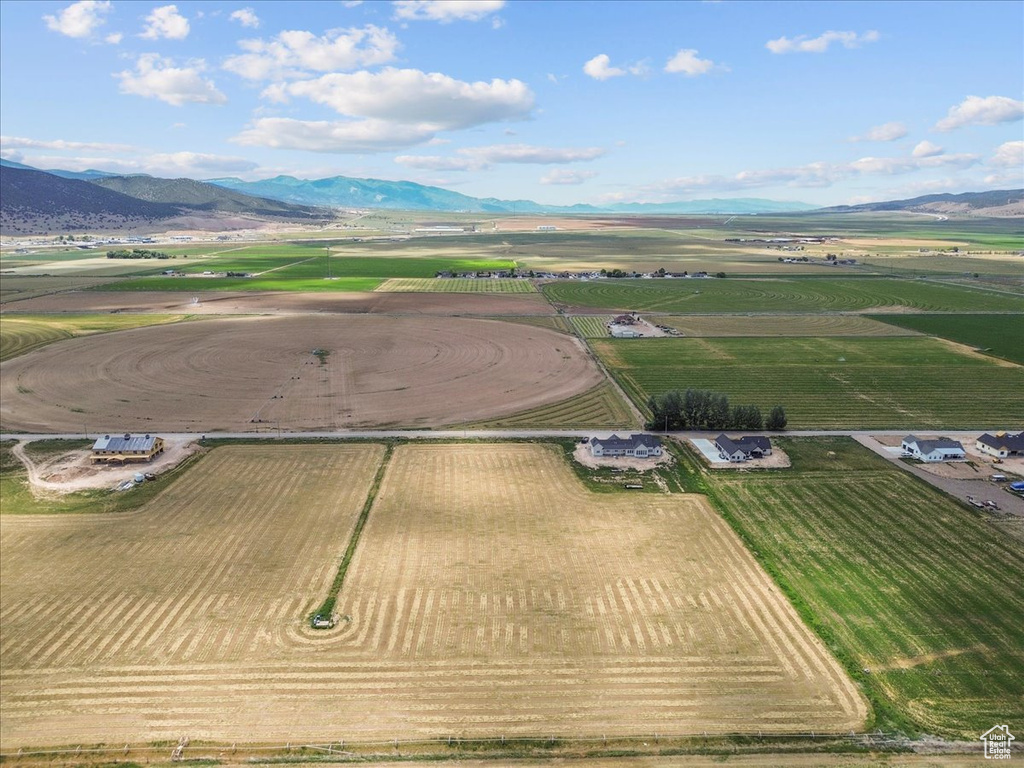 Overview of rural landscape with mountains and farmland