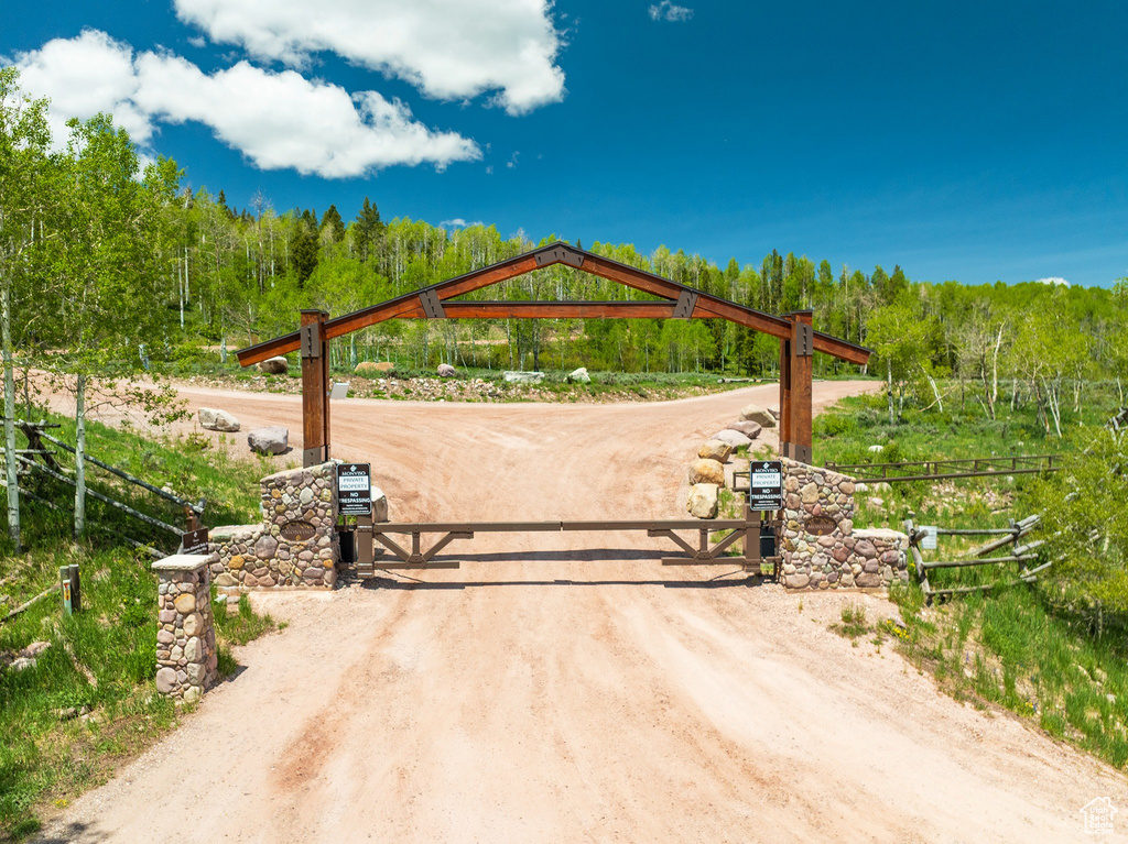 Gate featuring a view of trees