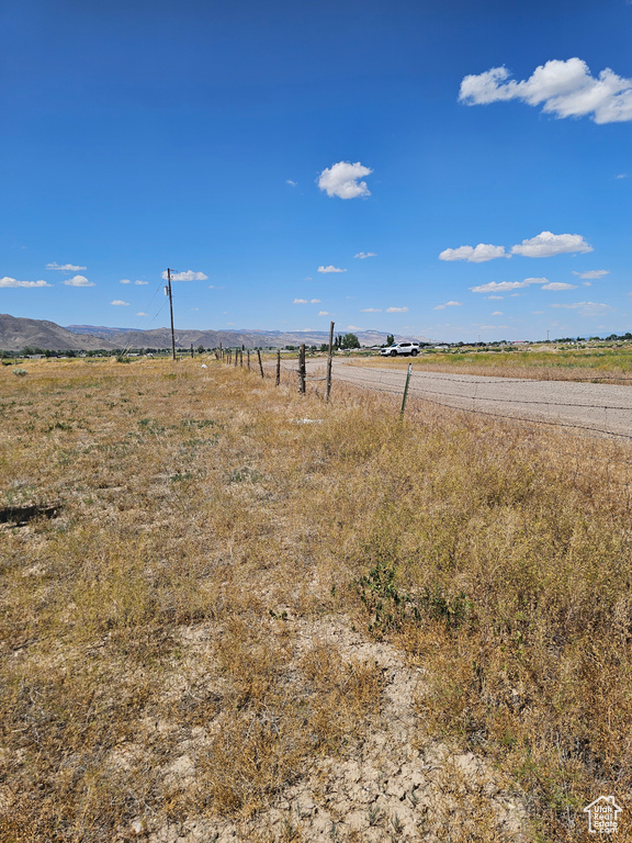 View of yard with a view of rural / pastoral area