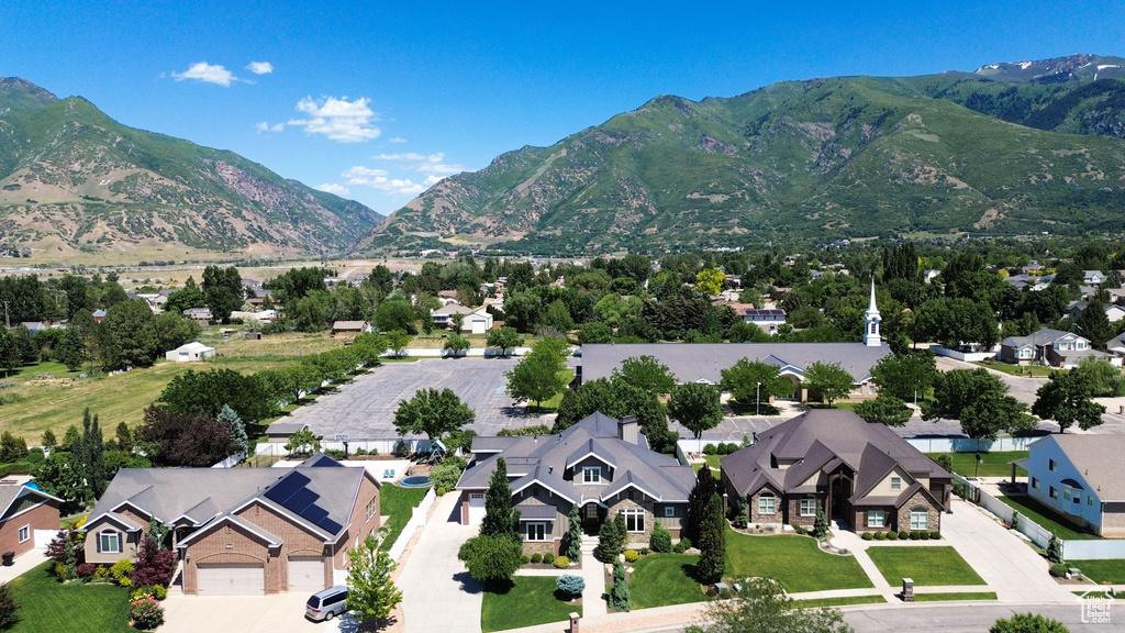 Mountain view featuring nearby suburban area
