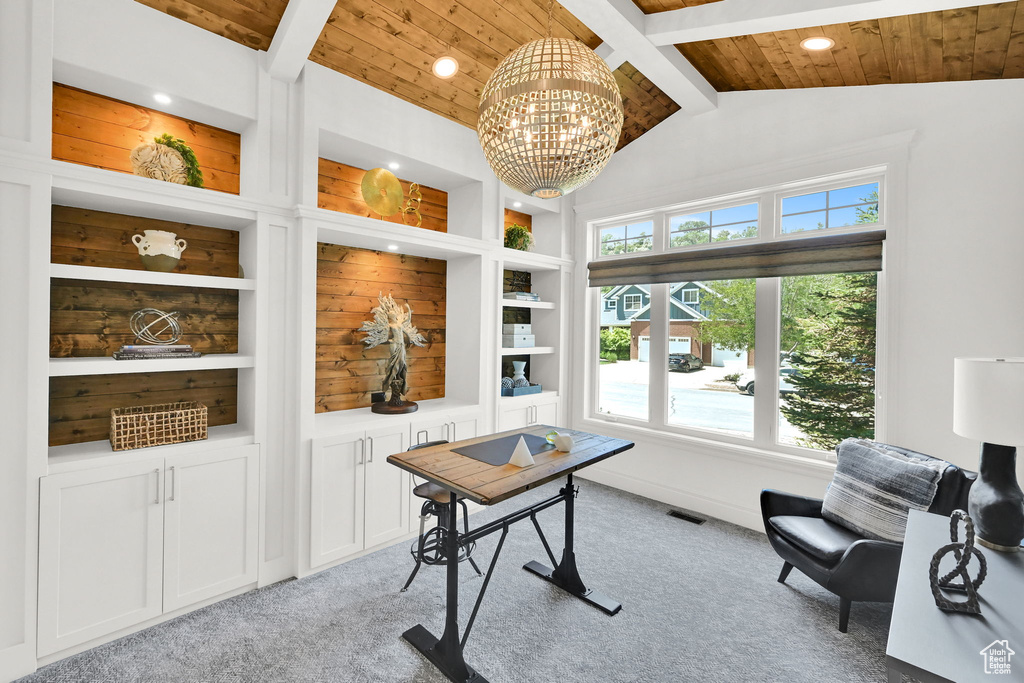 Home office with light colored carpet, wood ceiling, plenty of natural light, recessed lighting, and a chandelier