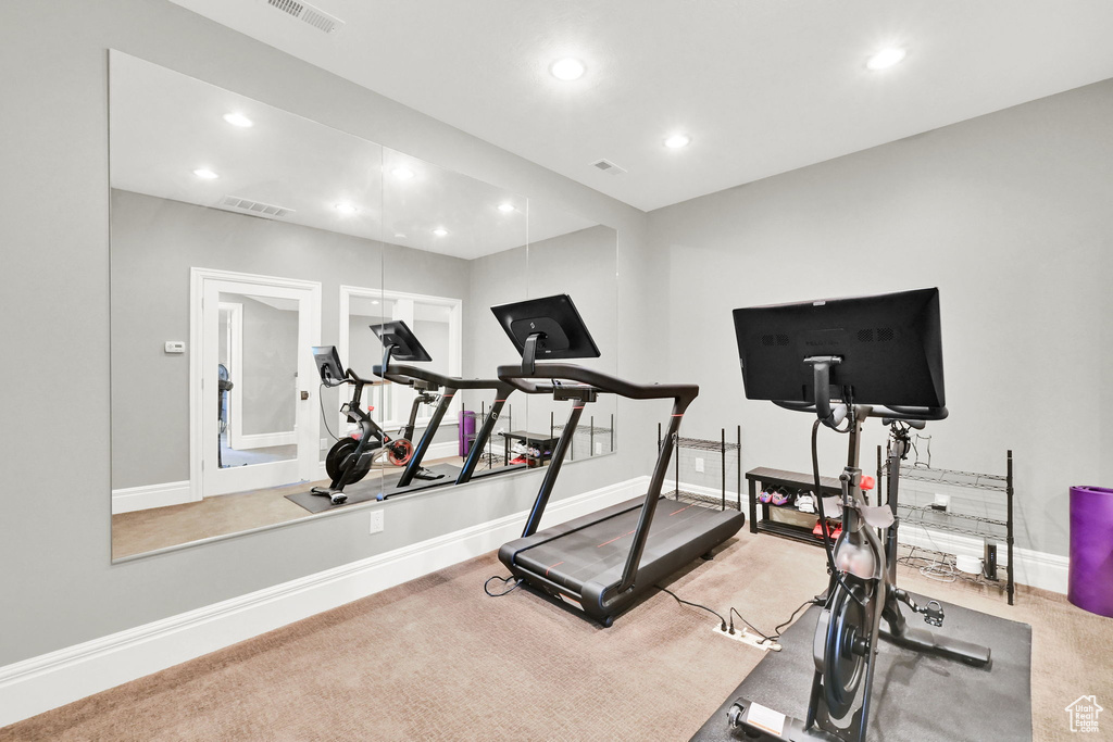 Workout room with recessed lighting, baseboards, and carpet flooring