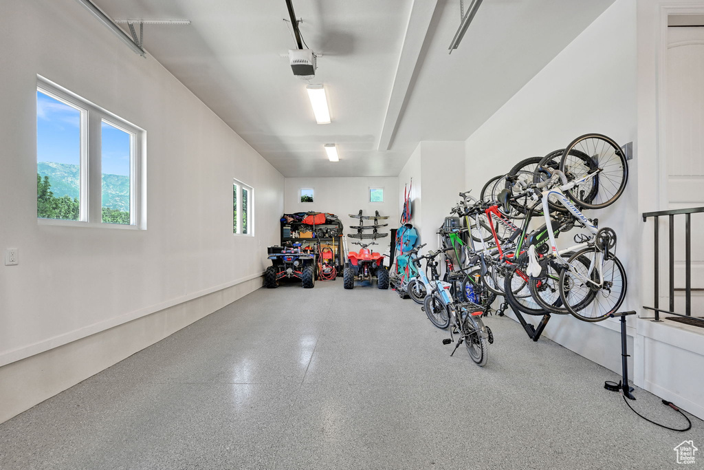 Garage featuring a garage door opener