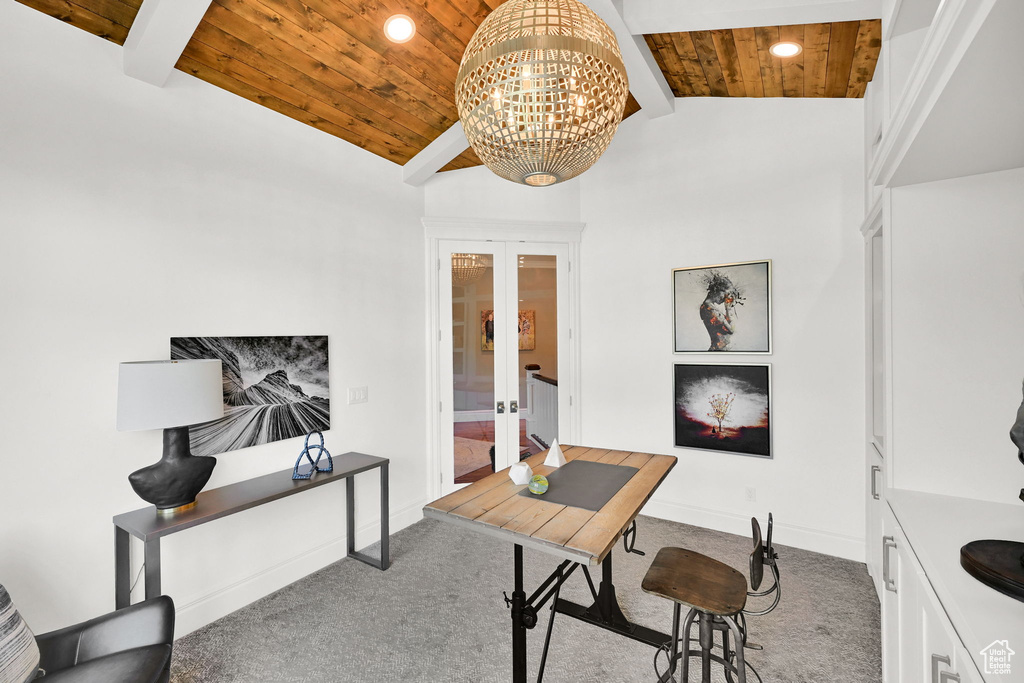 Office area featuring wooden ceiling, carpet floors, french doors, a chandelier, and baseboards