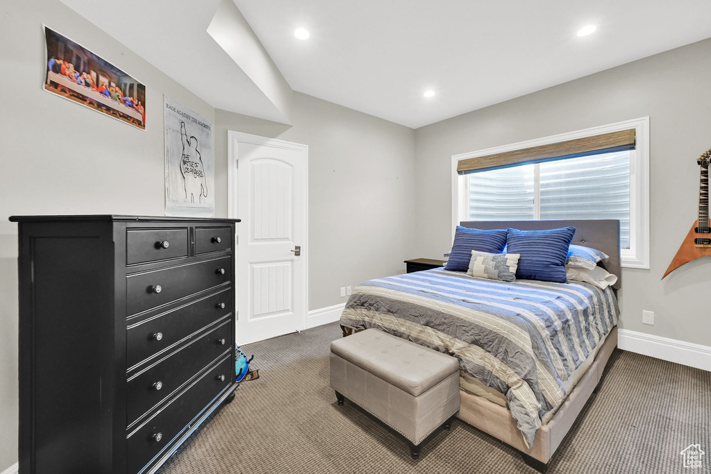Bedroom with carpet, baseboards, and recessed lighting