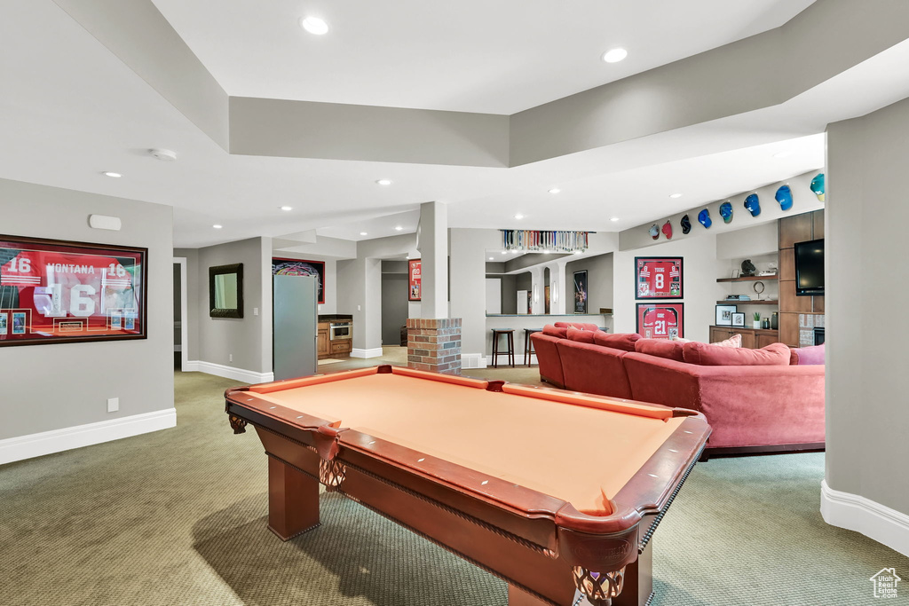 Game room featuring carpet flooring, recessed lighting, baseboards, pool table, and bar area