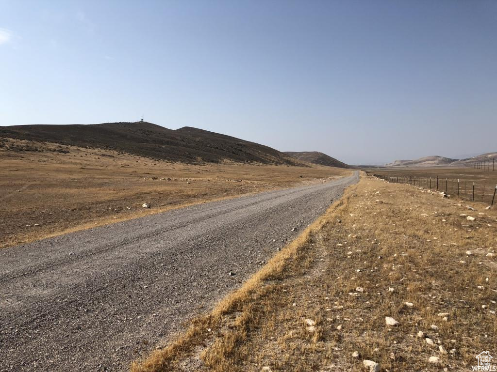 View of street featuring a mountain view and a rural view