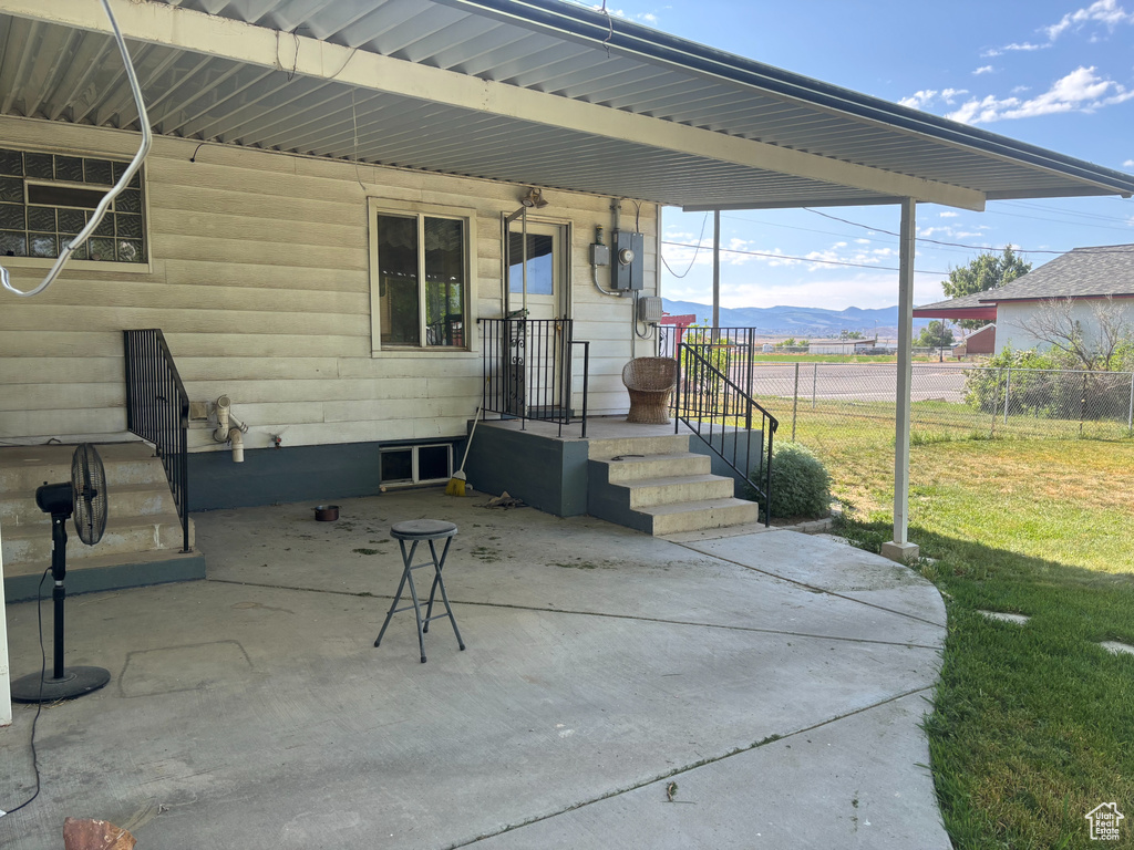 View of patio featuring a mountain view