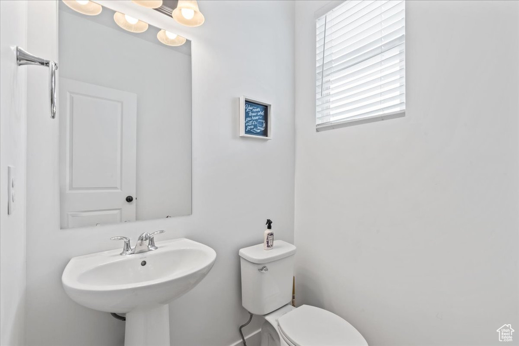 Bathroom with toilet and a sink