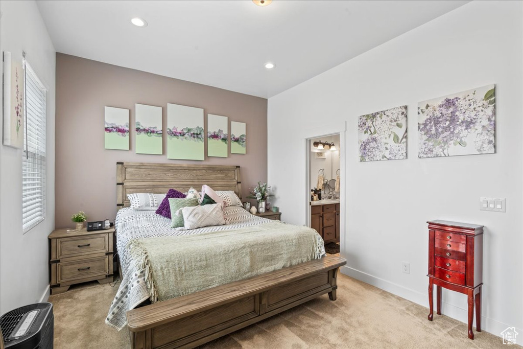 Bedroom featuring carpet, baseboards, connected bathroom, multiple windows, and recessed lighting