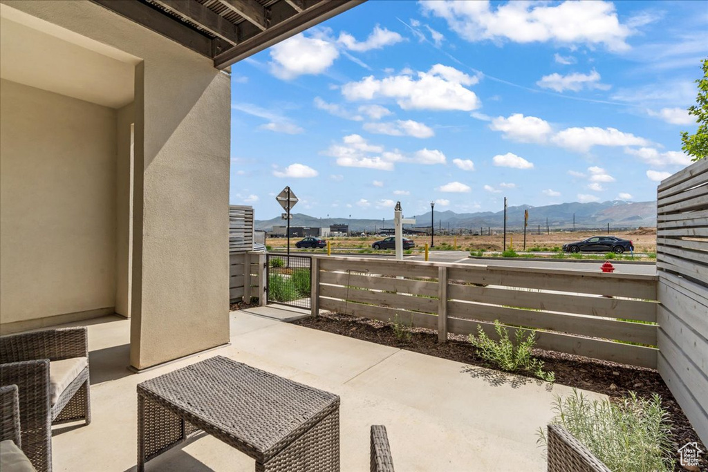 View of patio / terrace with a mountain view