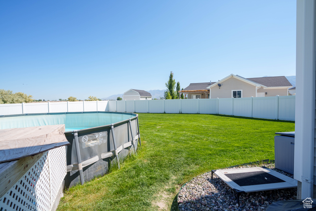 View of yard with cooling unit