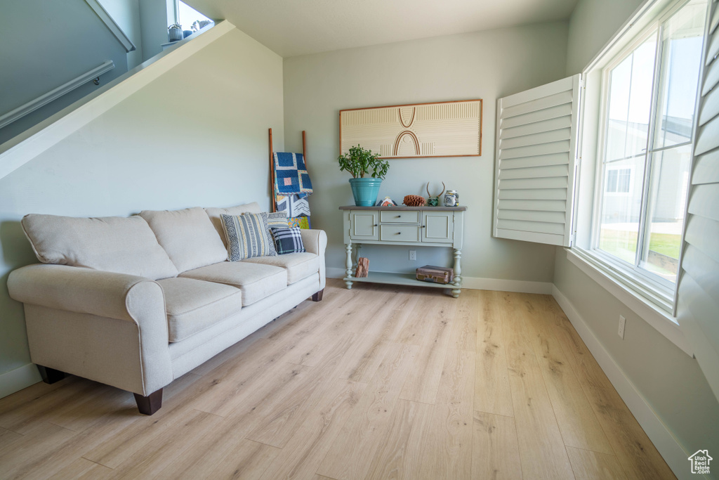 Living room featuring wood finished floors and baseboards