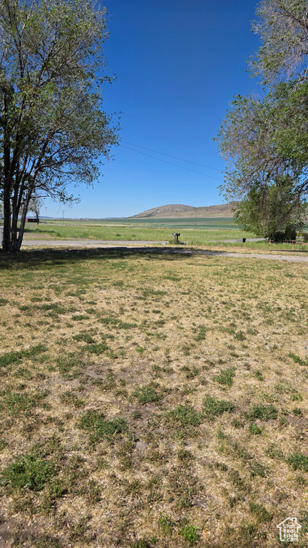 View of yard with a view of countryside