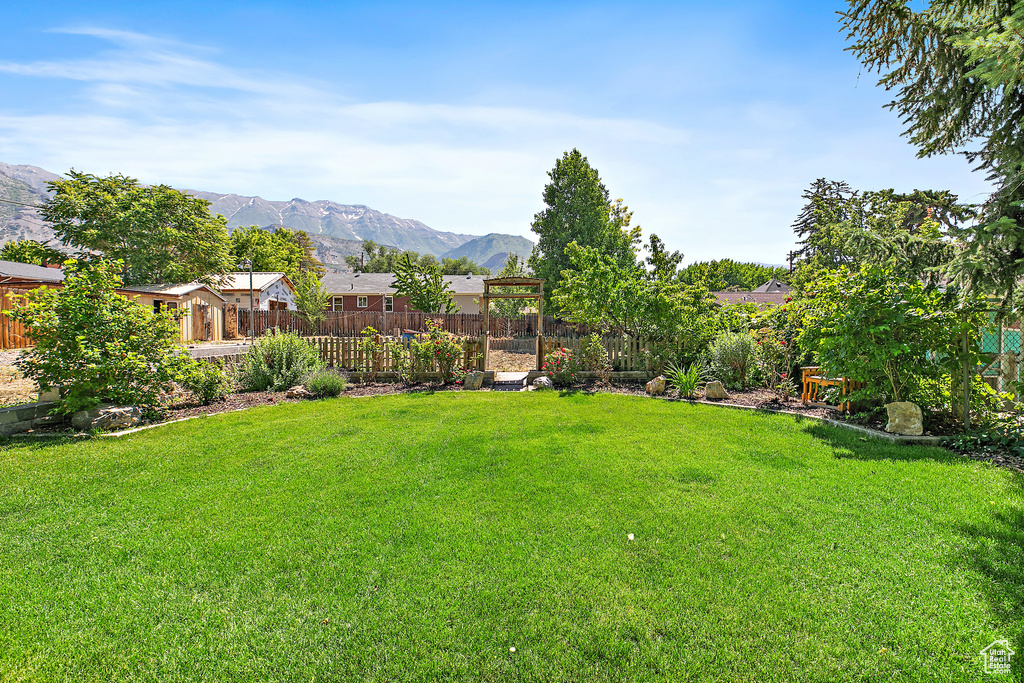 View of yard with a mountain view