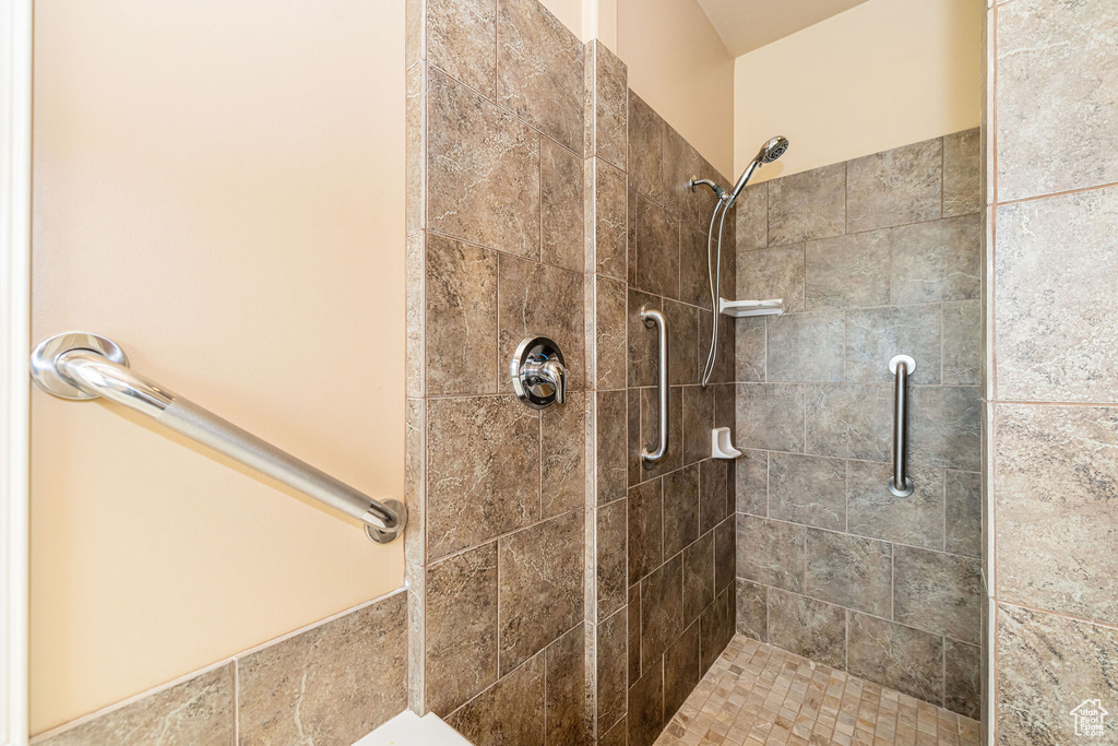 Bathroom with tiled shower