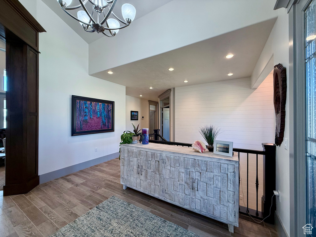 Reception area featuring a chandelier and recessed lighting