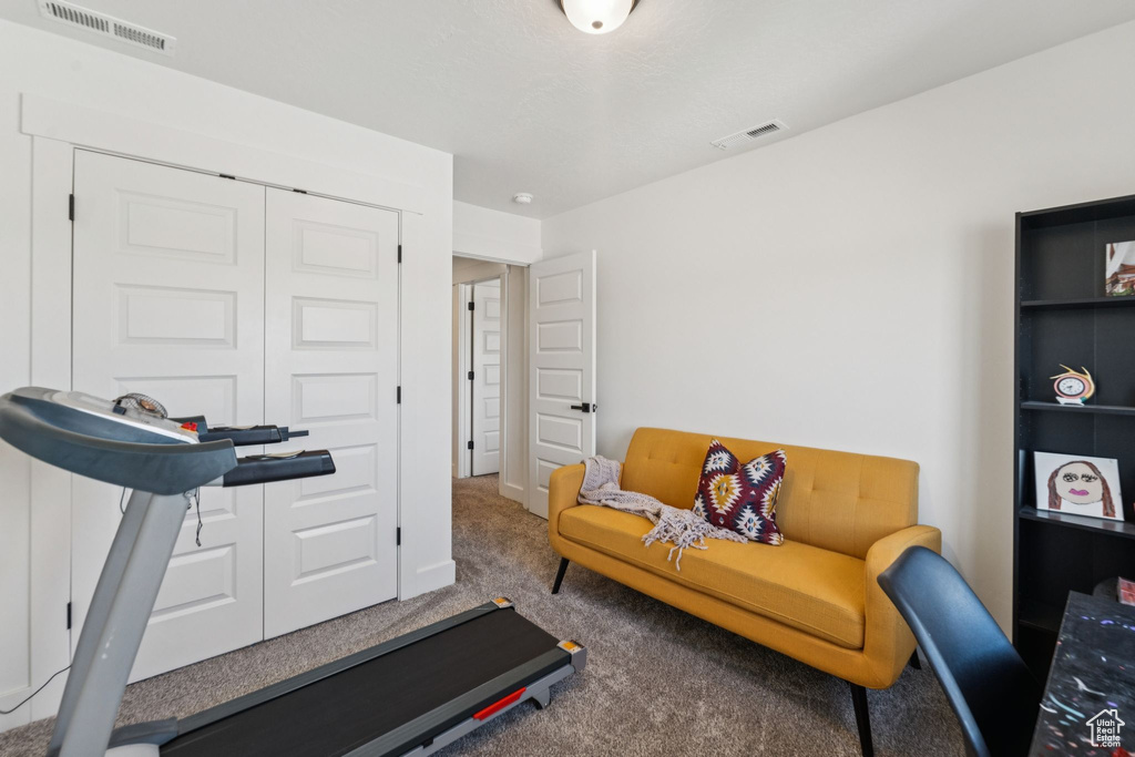 Exercise room with carpet floors