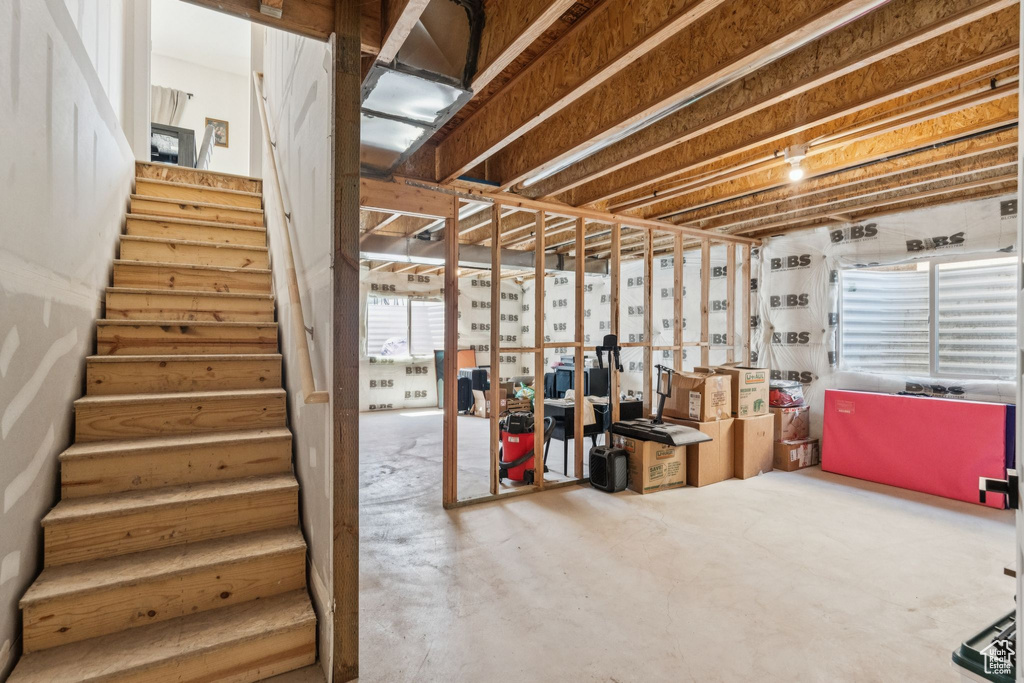 Unfinished basement with stairs