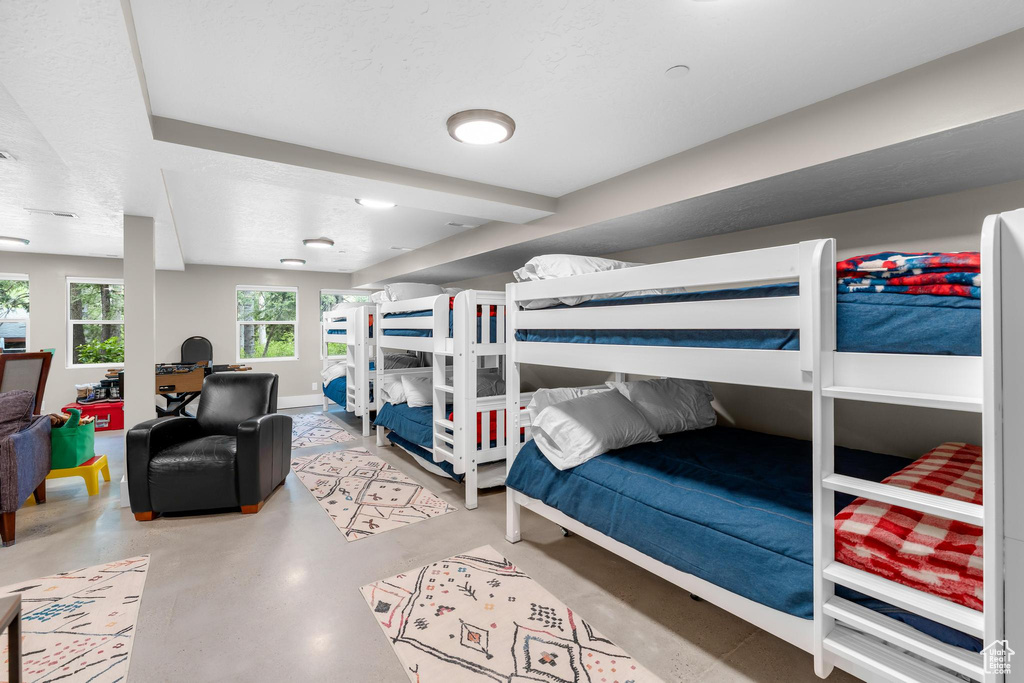 Bedroom with concrete floors