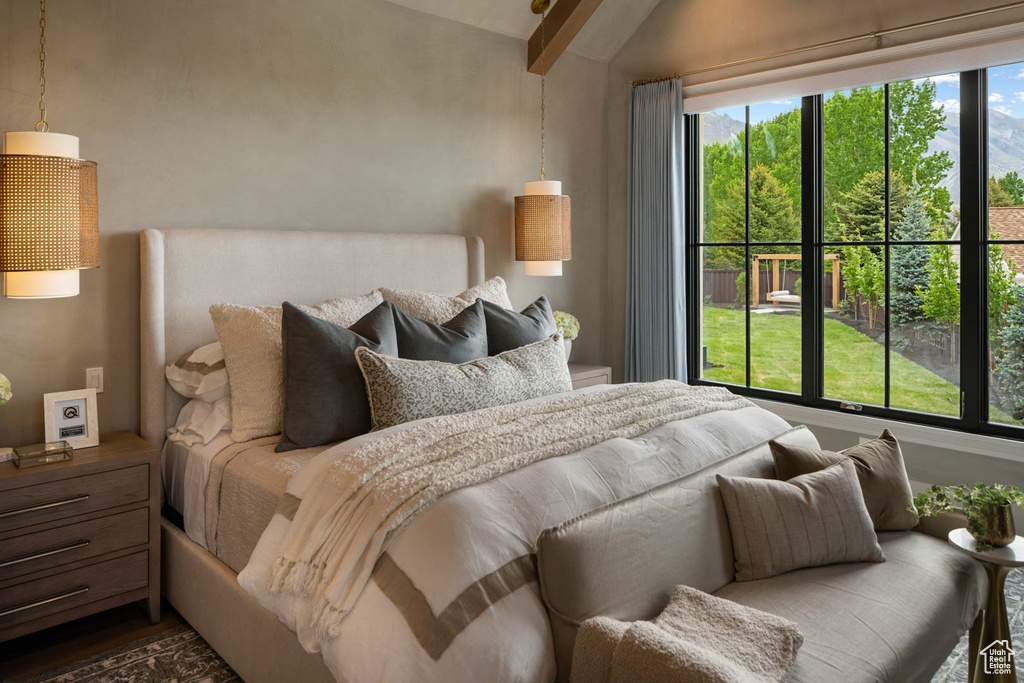 Bedroom with dark wood-type flooring