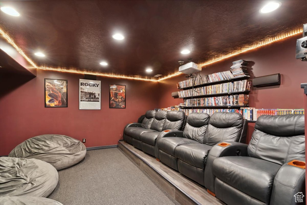 Cinema room featuring recessed lighting and carpet flooring