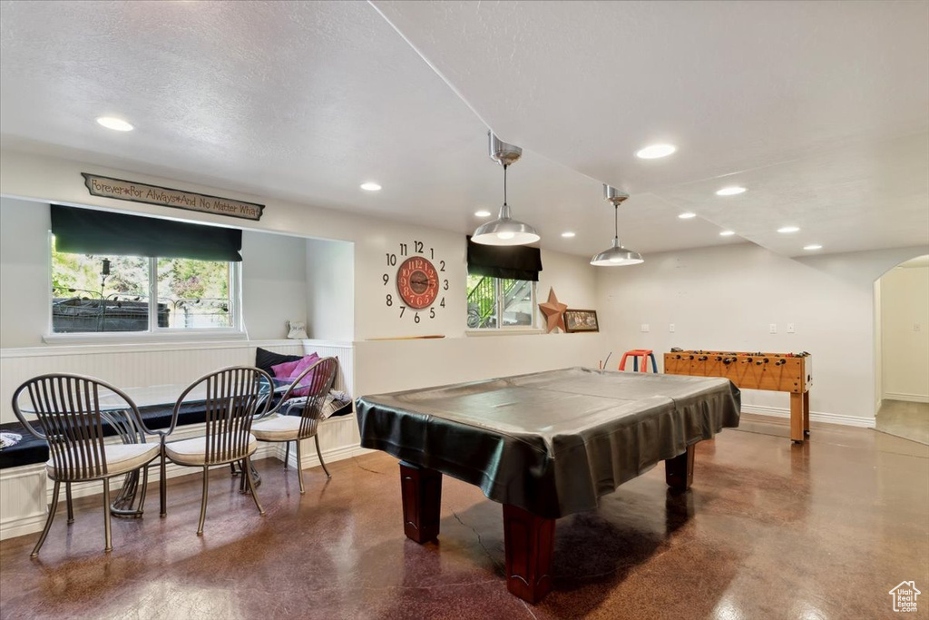 Game room featuring concrete flooring, billiards table, recessed lighting, and baseboards