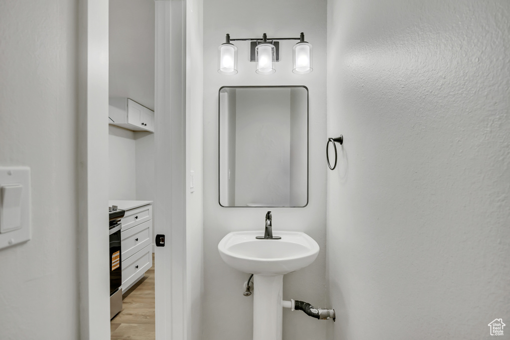 Bathroom with wood finished floors