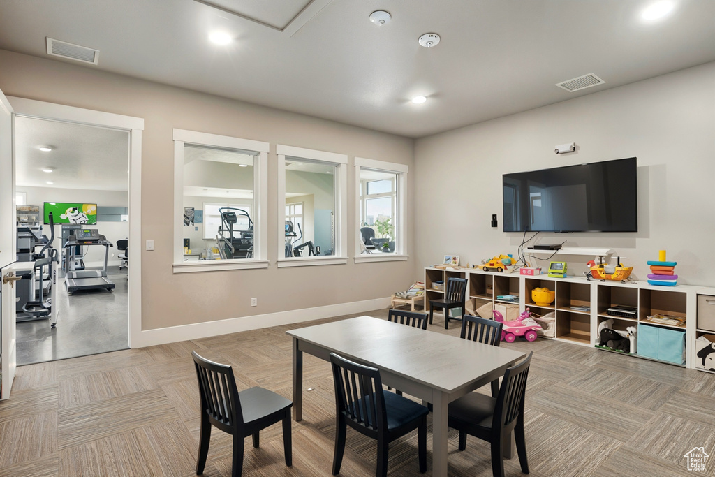 Game room featuring baseboards and recessed lighting