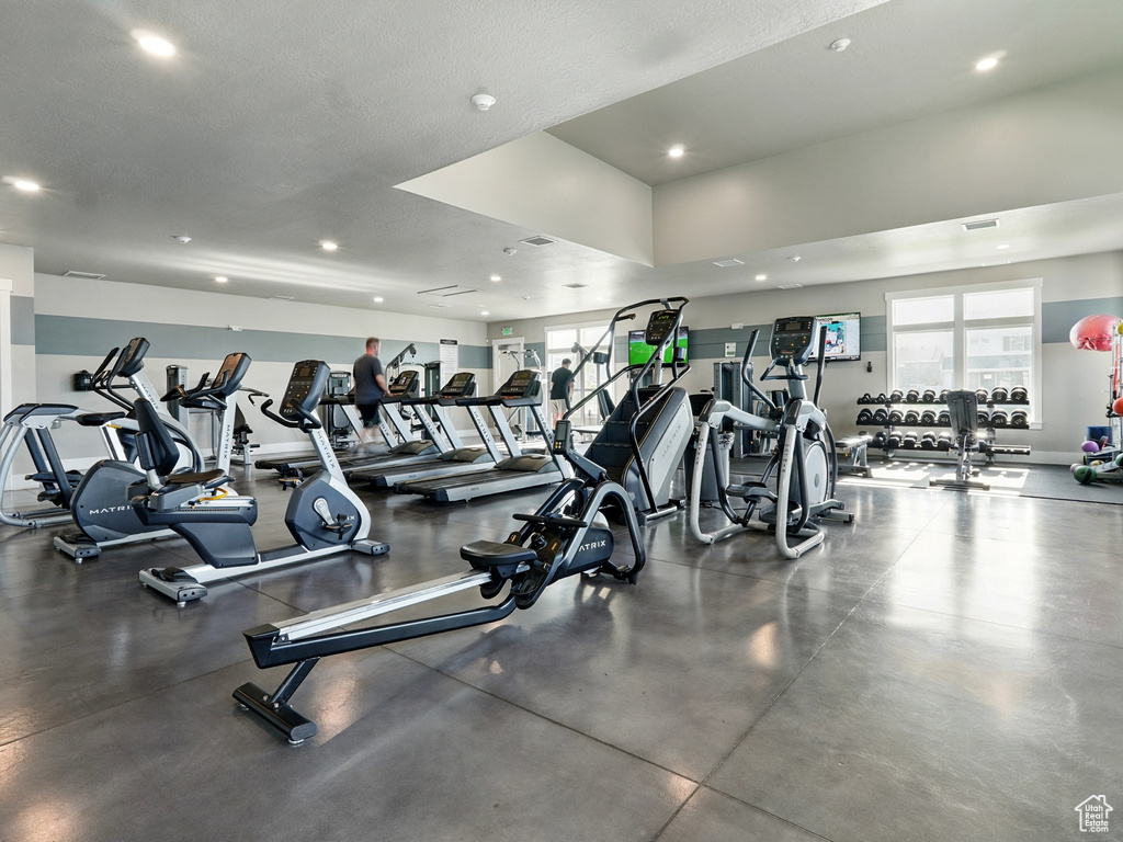 Gym featuring plenty of natural light and recessed lighting