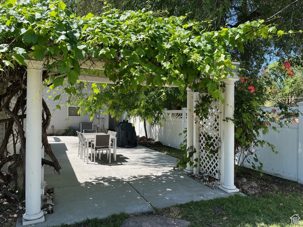 View of patio with outdoor dining space