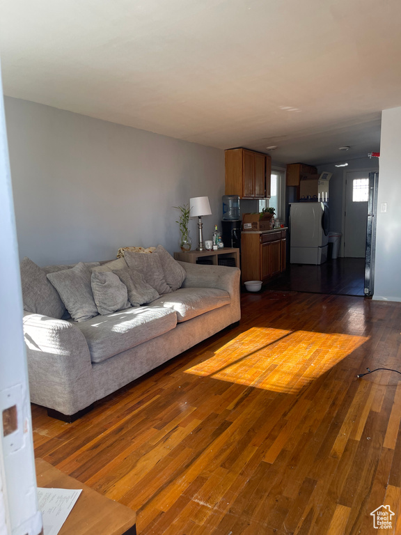 Living area featuring dark wood finished floors