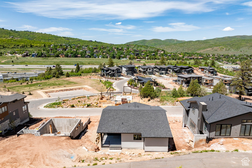 Aerial view of residential area with a mountainous background