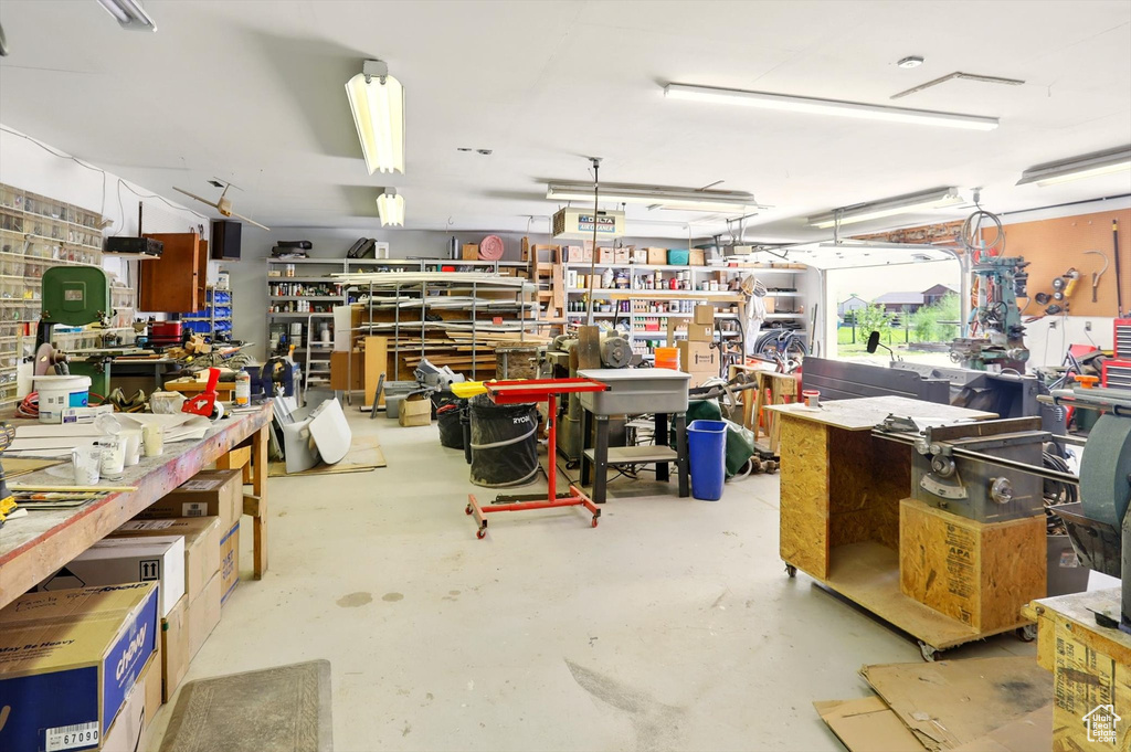 Garage featuring a workshop area