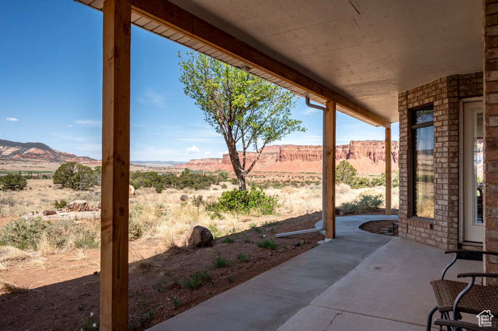 View of patio with a mountain view