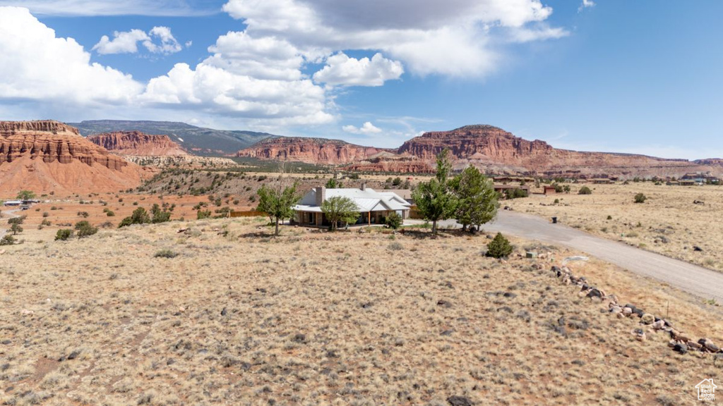 View of mountain backdrop featuring rural landscape